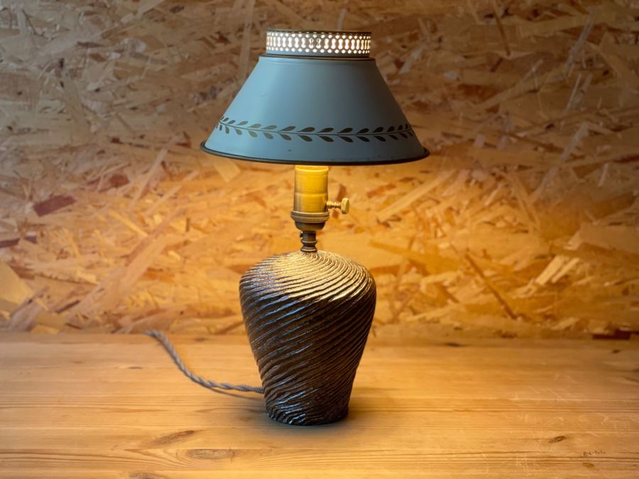 Dark spiral lamp with tole shade
