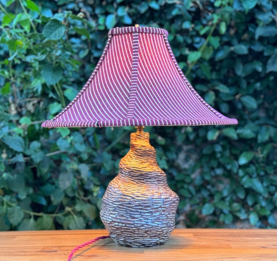 Textured bulb lamp with purple striped shade