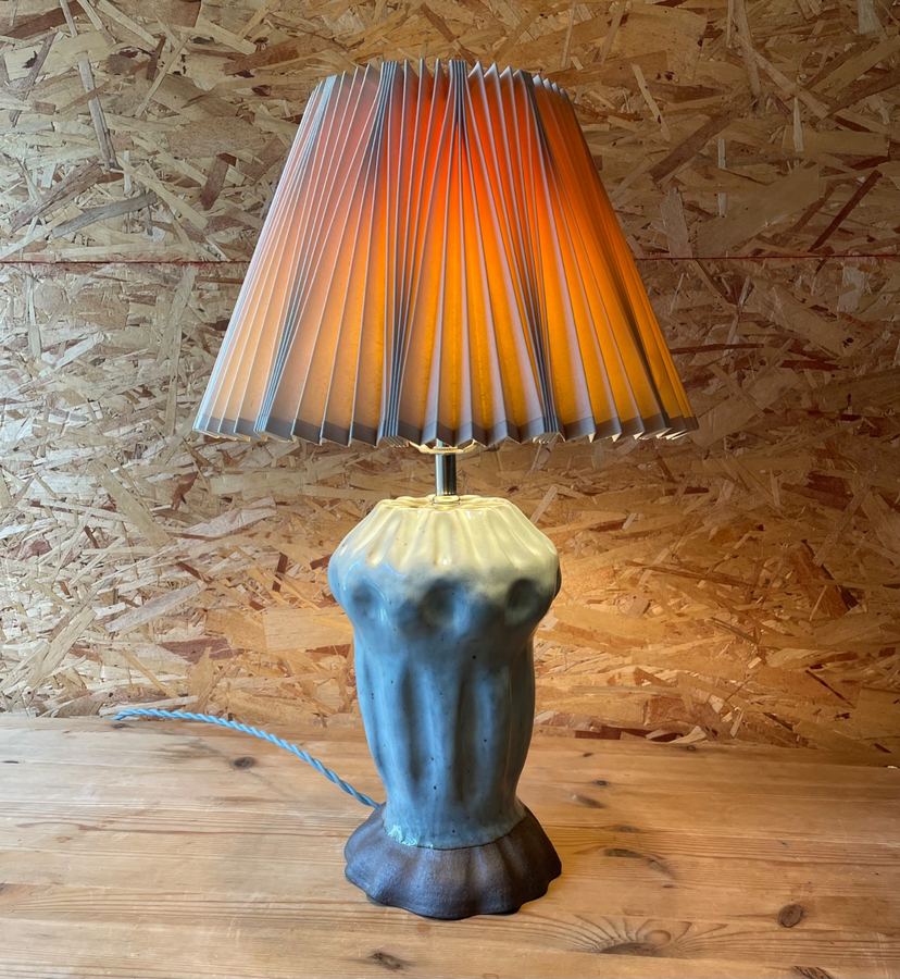 Blue teardrop lamp with double tier parchment shade