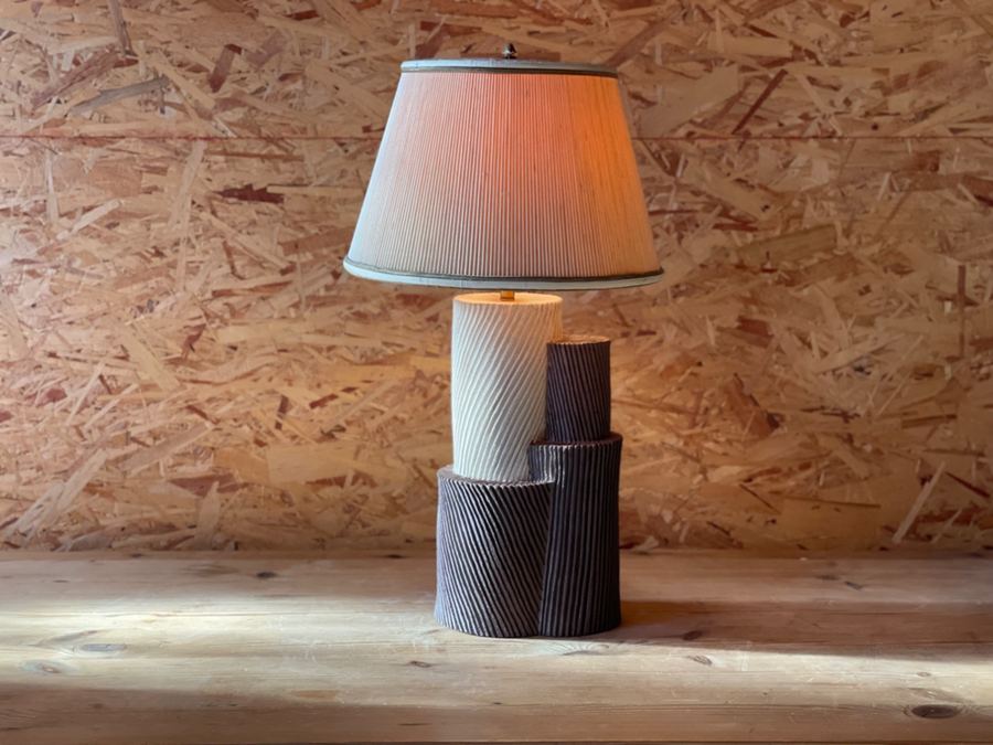 Ribbed cylinder totem lamp side angle warm light