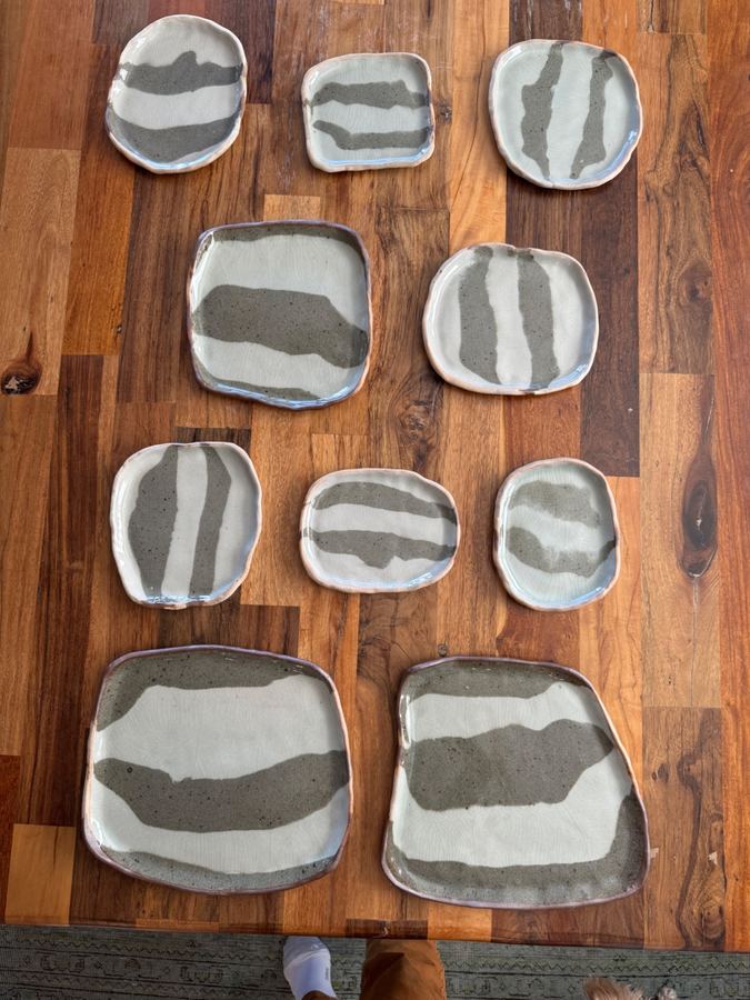 Stack of dark stoneware bowls side on