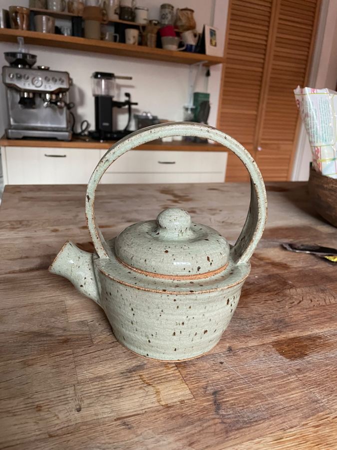 Speckled celadon teapot in kitchen